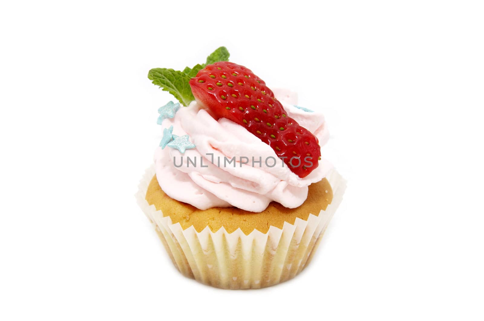 a small cake with cream on a white background