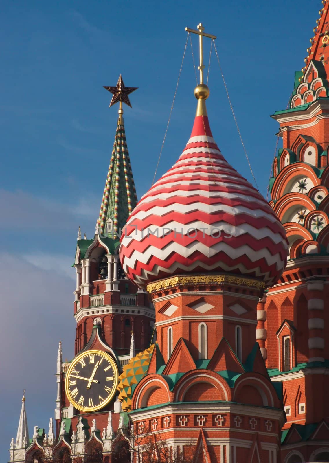 Domes of St. Basil's Cathedral and the Kremlin's Spassky Tower in Moscow