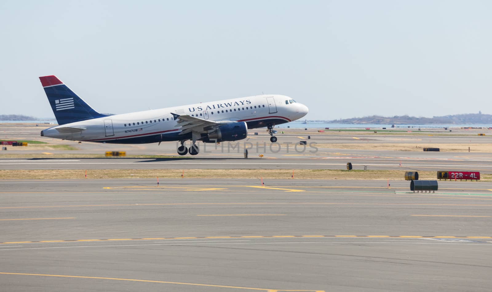 BOSTON, USA - MARCH 22: US Airways Airbus A319 takes off on March 19, 2012. Logan Airport is the largest in New England