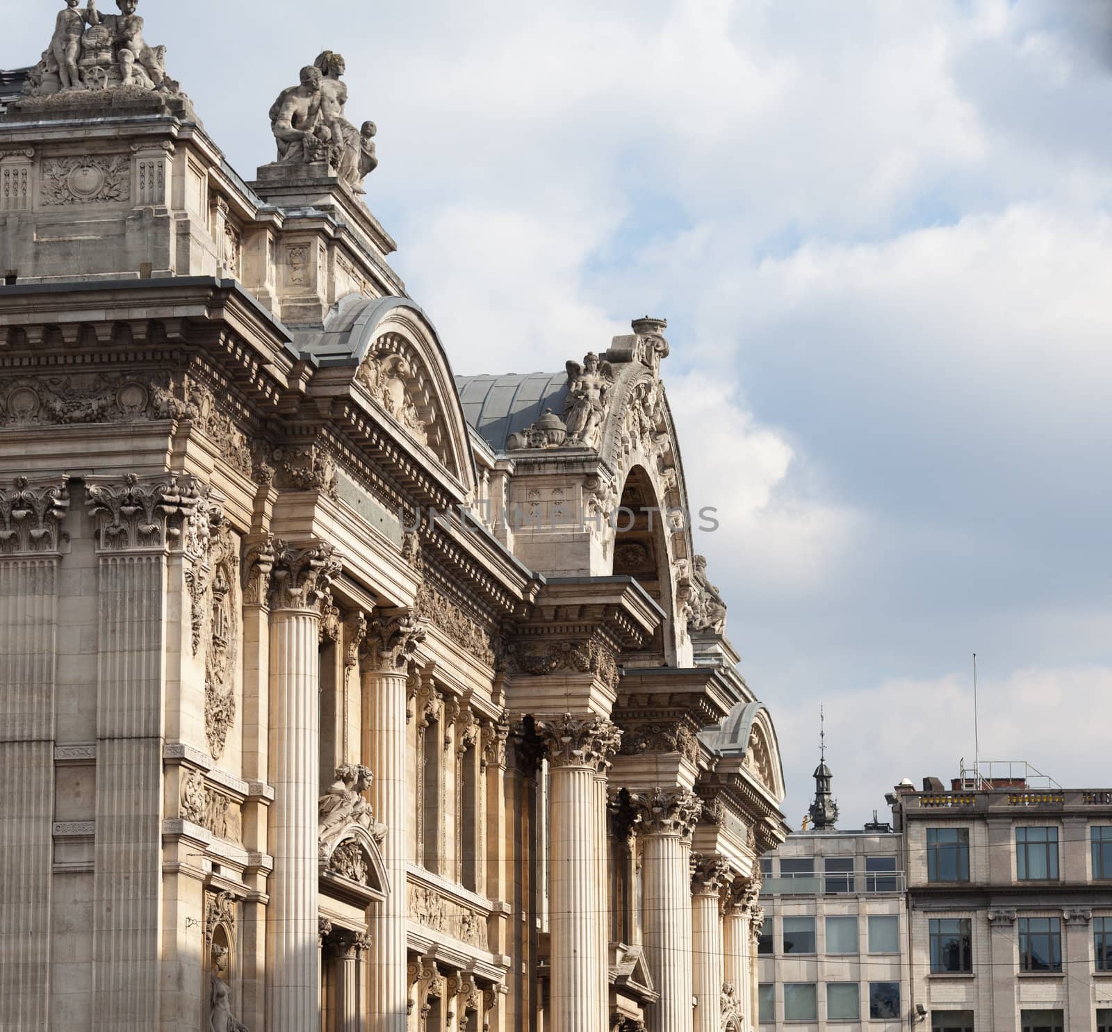 Facade of the Bourse in Brussels with the carved entrance arch