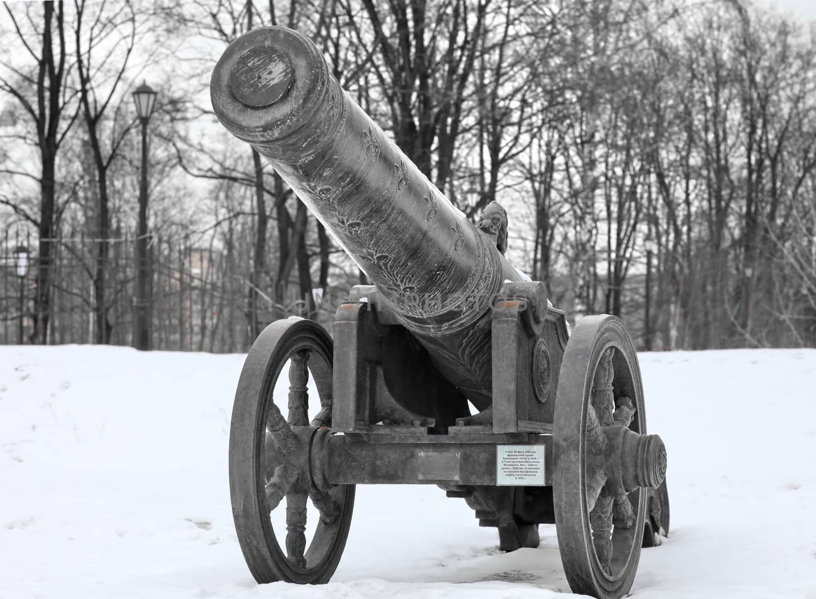 The old medieval bronze cannon on the gun carriage