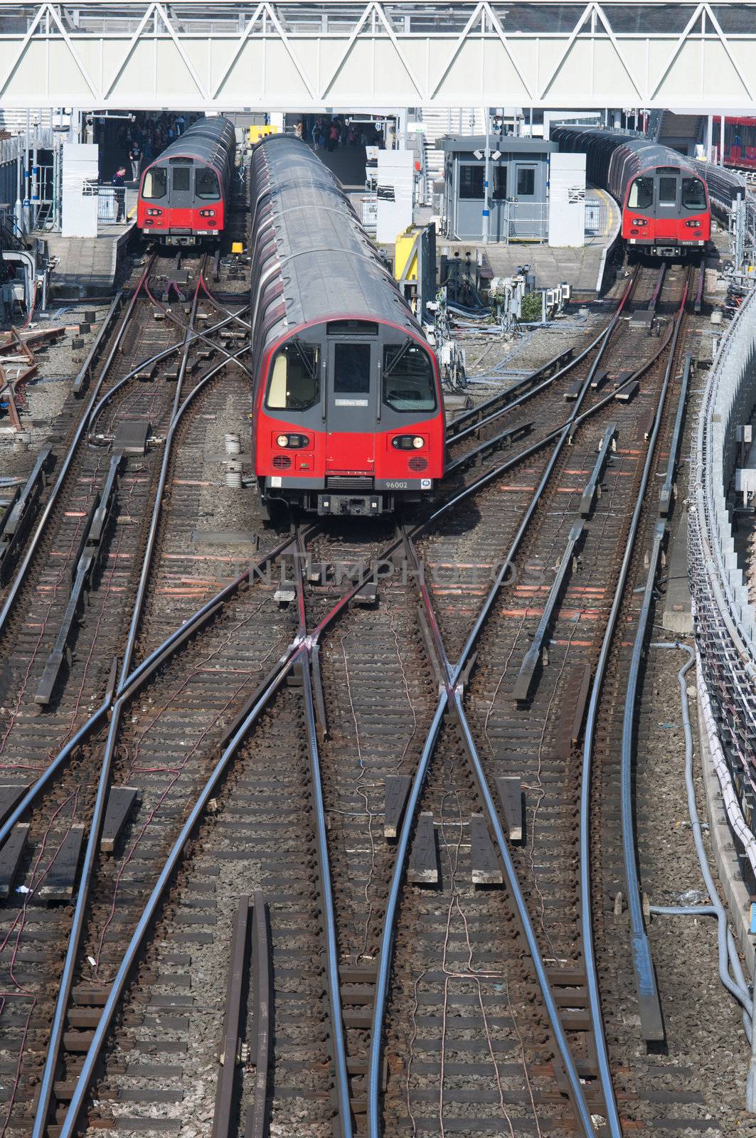 LONDON, UK – MARCH 24: High angle shot of London Underground trains at station and tracks, on March 24, 2012 in London.