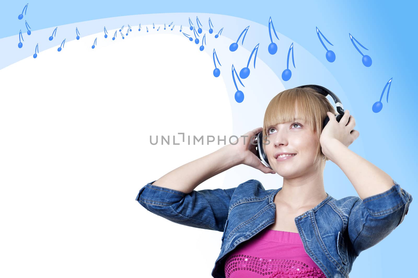 Young attractive woman listing to music with headphones, Notes are flying around a woman