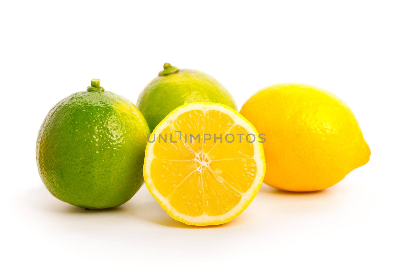 yellow and green lemon over white background.