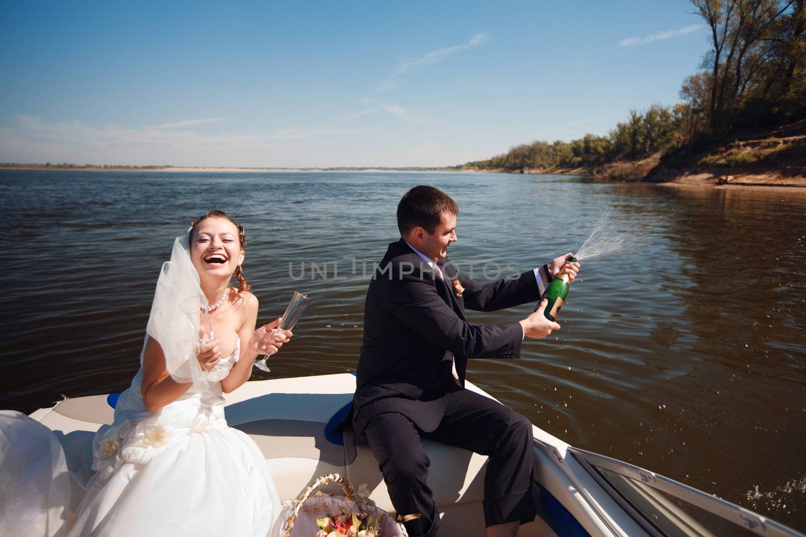 bride and groom on the boat by vsurkov