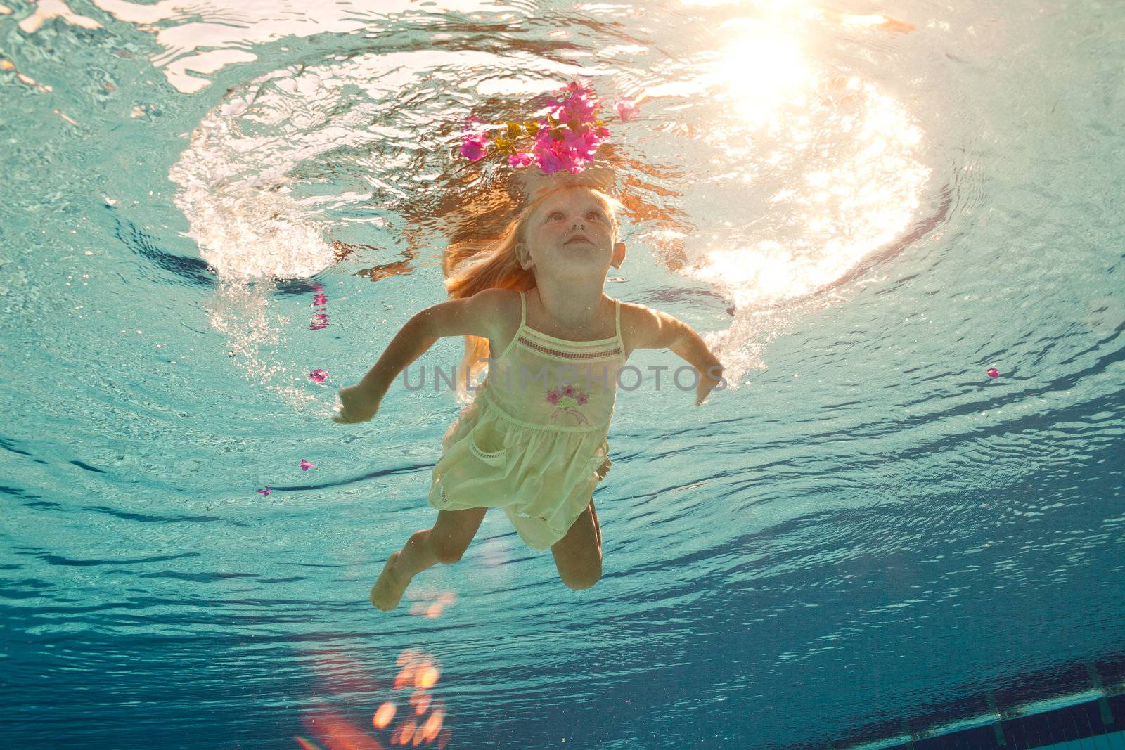 swimming under the water girl with flower by vsurkov
