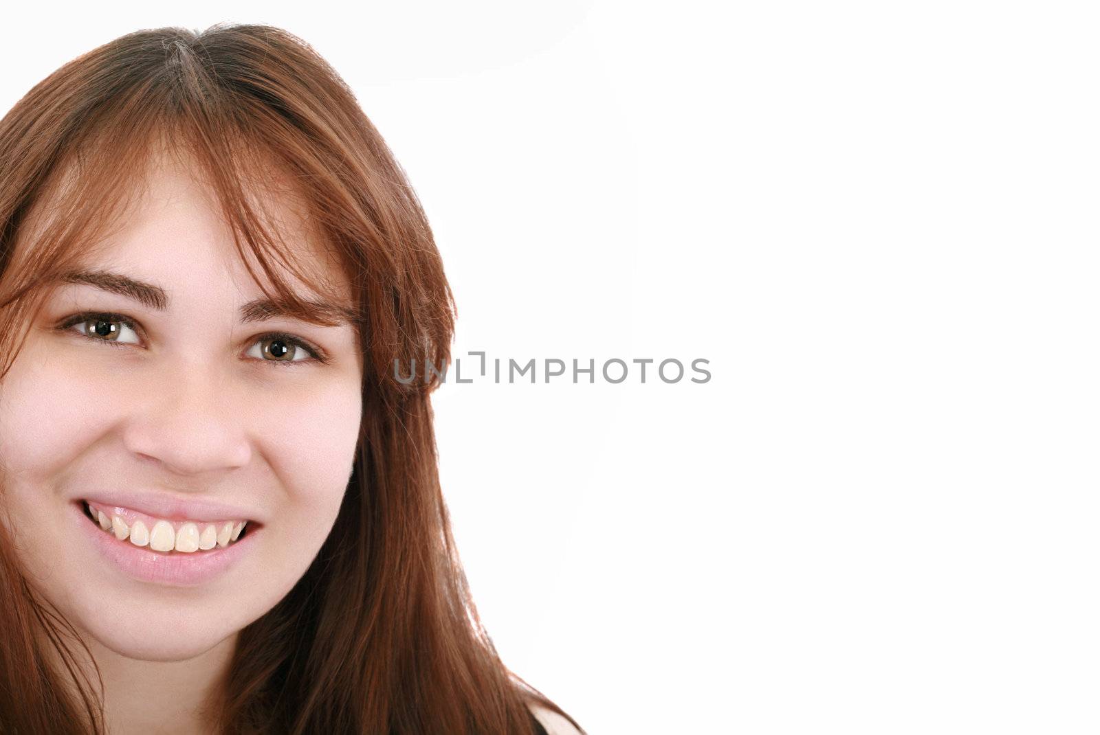 Pretty young woman smiling - copyspace