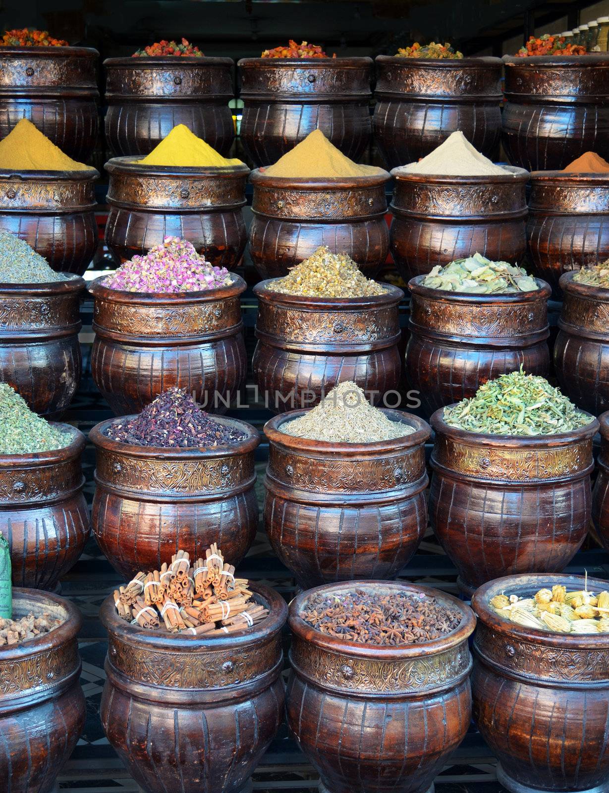 Colorful basket full of spices in traditional market or shop