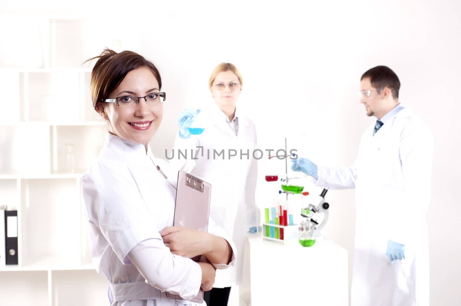 portrait of doctor, holds a tablet in the office