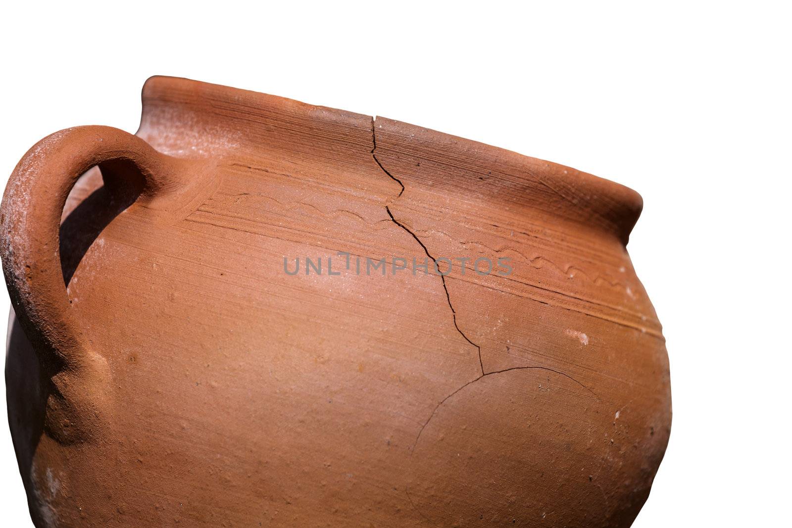 Old, cracked clay pot isolated on white background