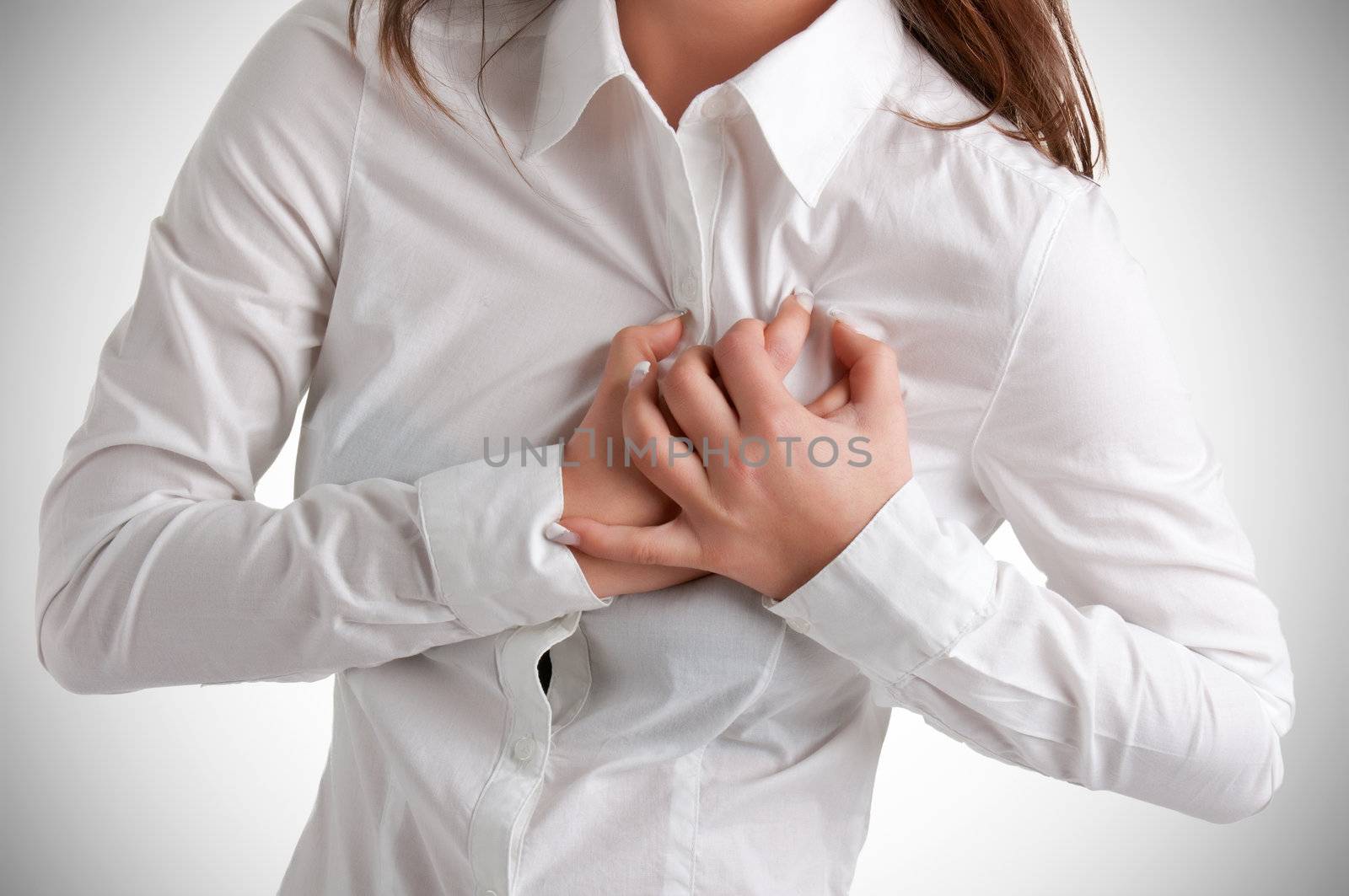 Woman having a pain in the heart area