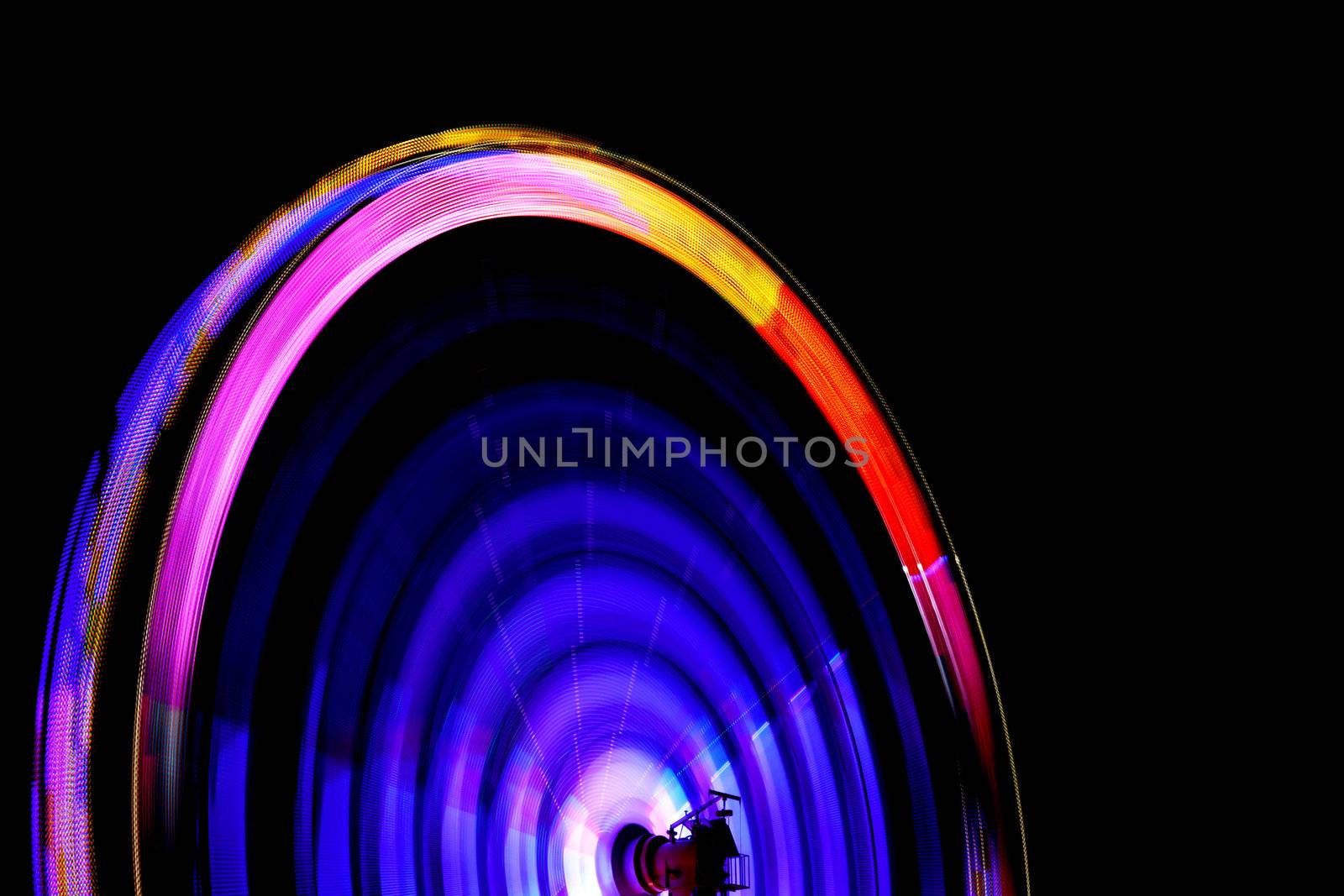 Thrill ride at the fair at night