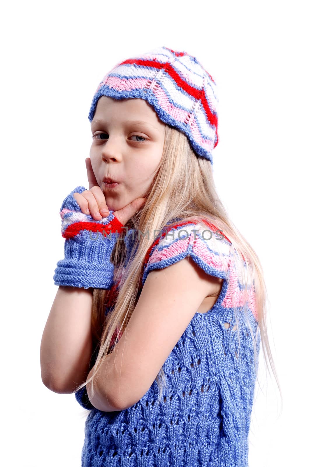 A portrait of a thoughtful little girl isolated on the white background