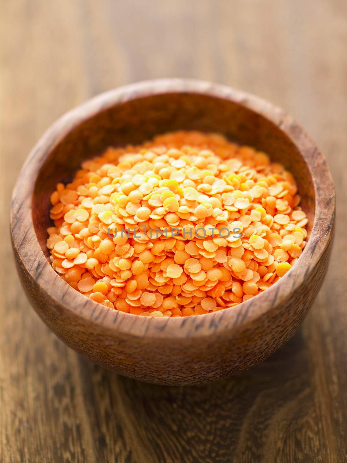 close up of a bowl of red lentils