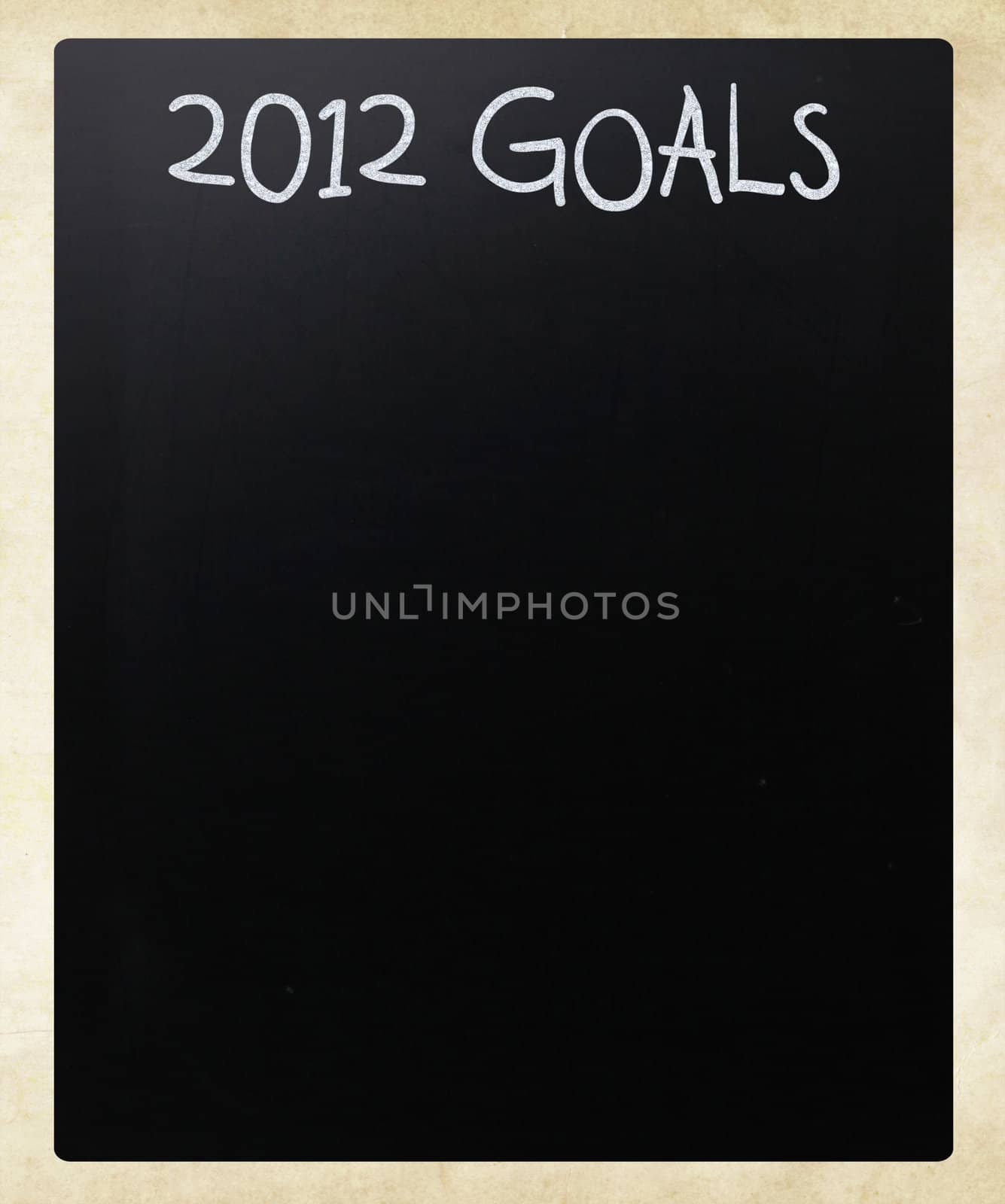 "2012 goals" handwritten with white chalk on a blackboard