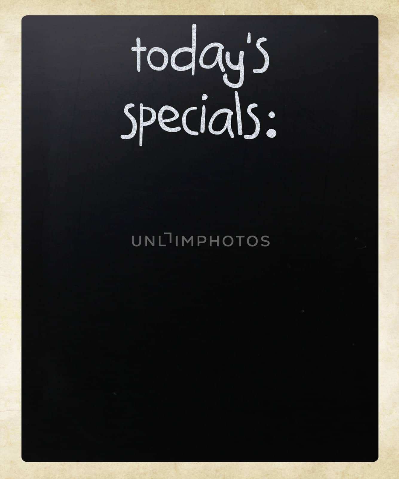 "Today's specials" handwritten with white chalk on a blackboard