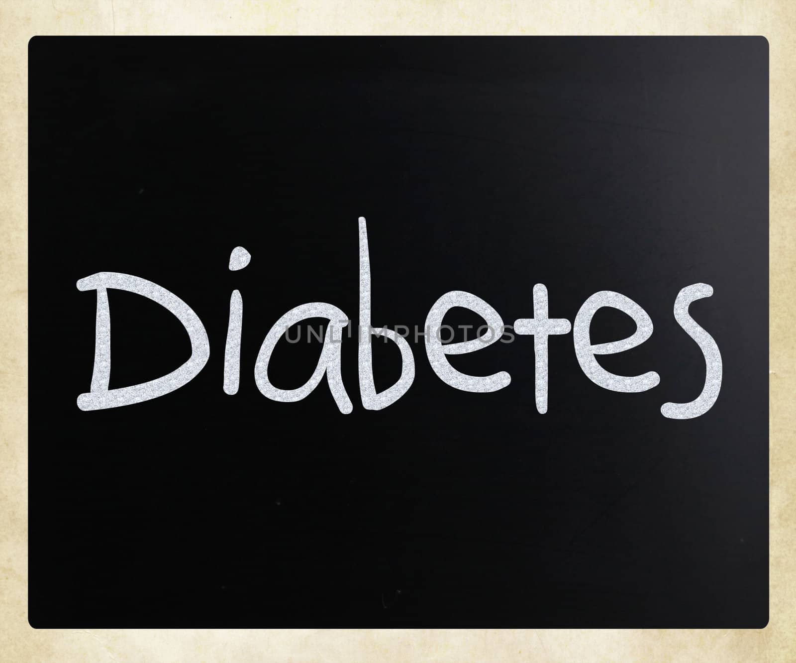 The word "Diabetes" handwritten with white chalk on a blackboard