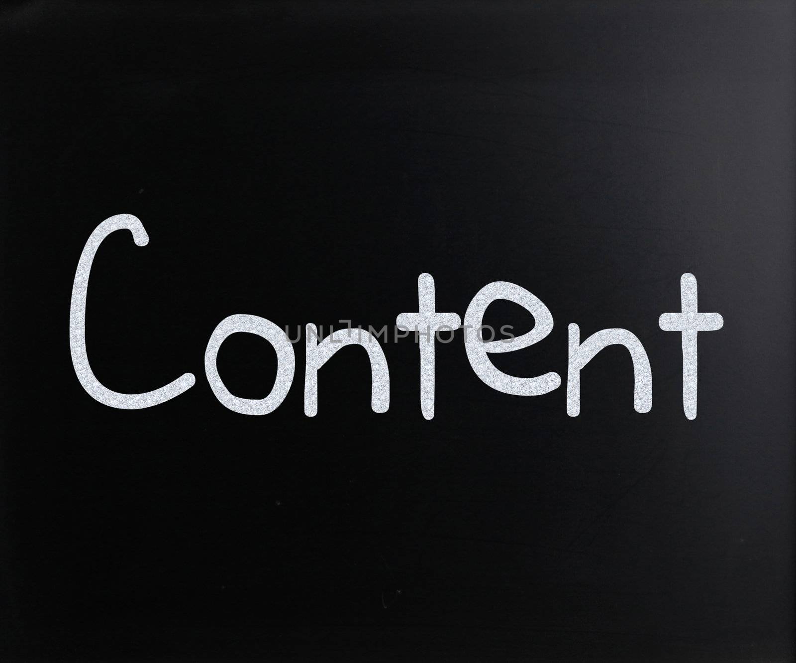 The word "Content" handwritten with white chalk on a blackboard