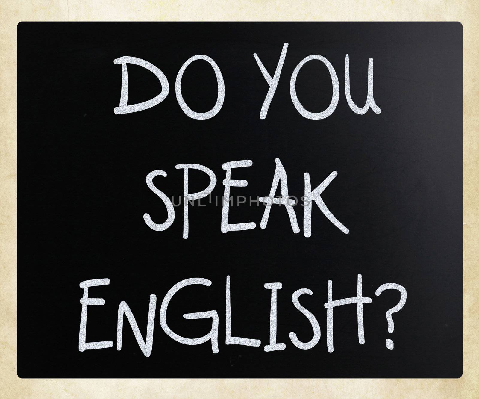 "Do you speak english" handwritten with white chalk on a blackboard