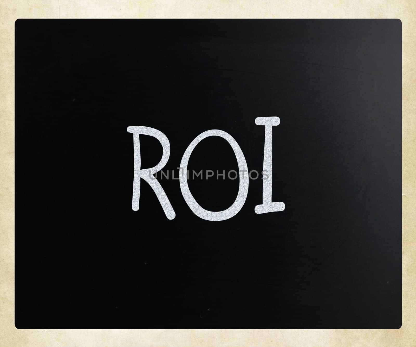 The word "ROI" handwritten with white chalk on a blackboard