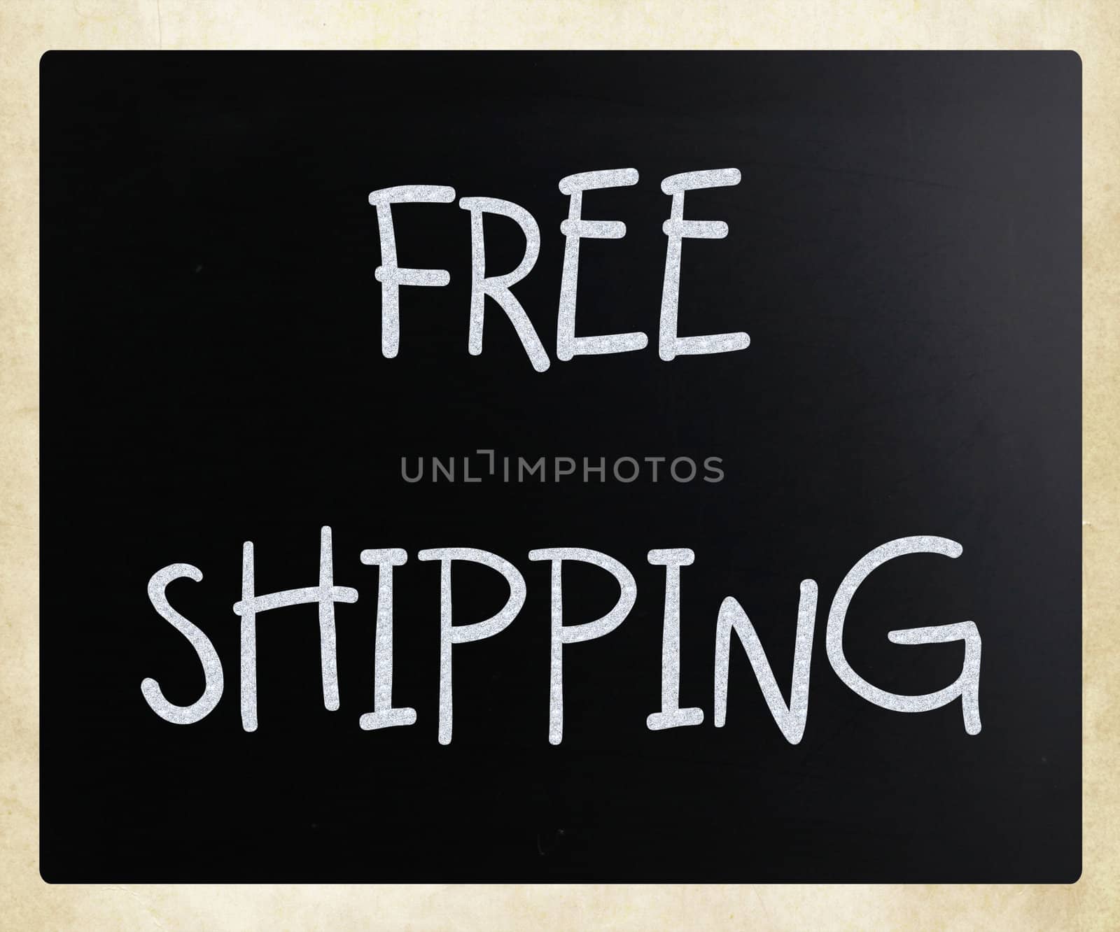"Free shipping" handwritten with white chalk on a blackboard