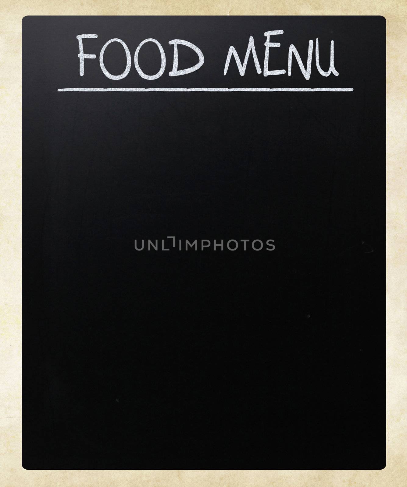 "Food menu" handwritten with white chalk on a blackboard