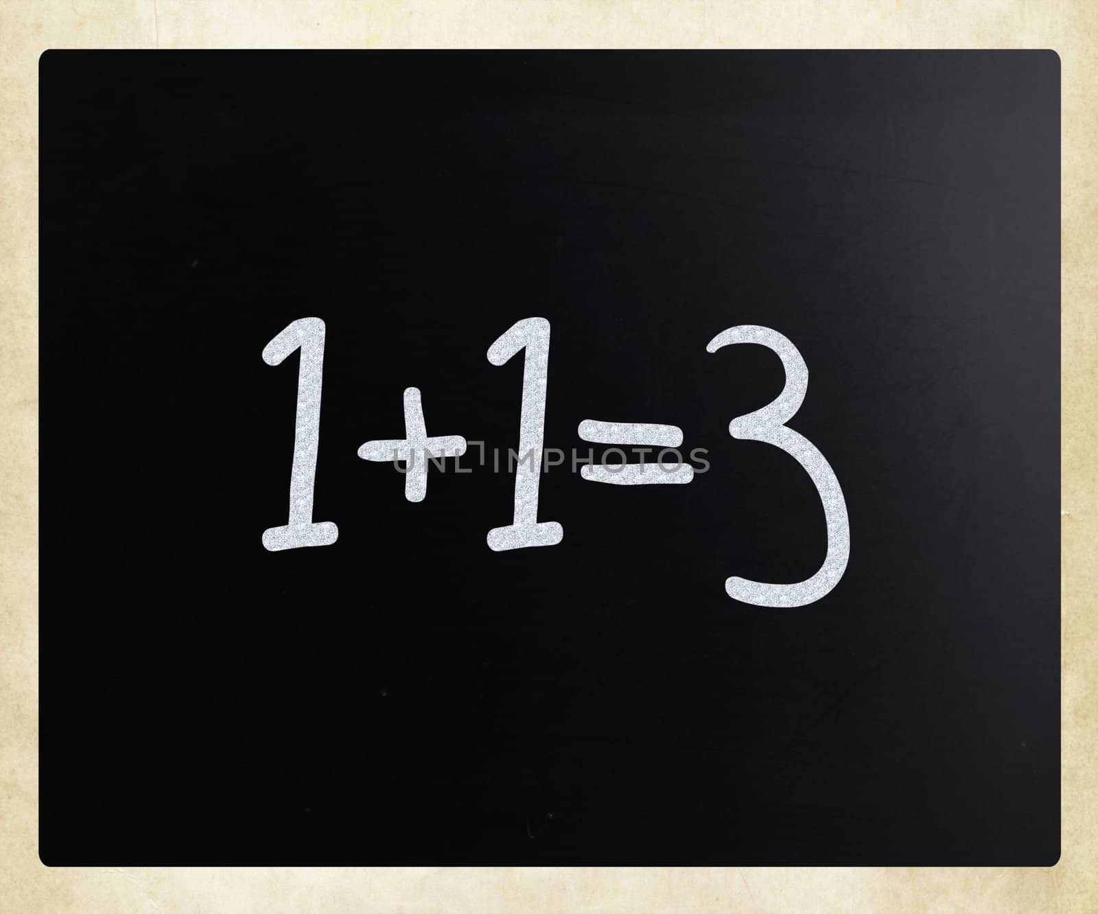"1+1=3" handwritten with white chalk on a blackboard