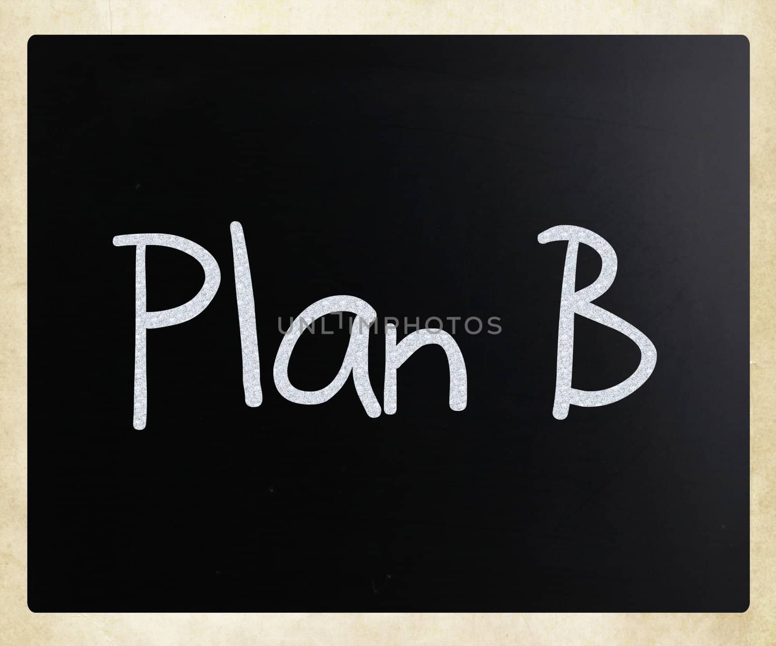 "Plan B" handwritten with white chalk on a blackboard