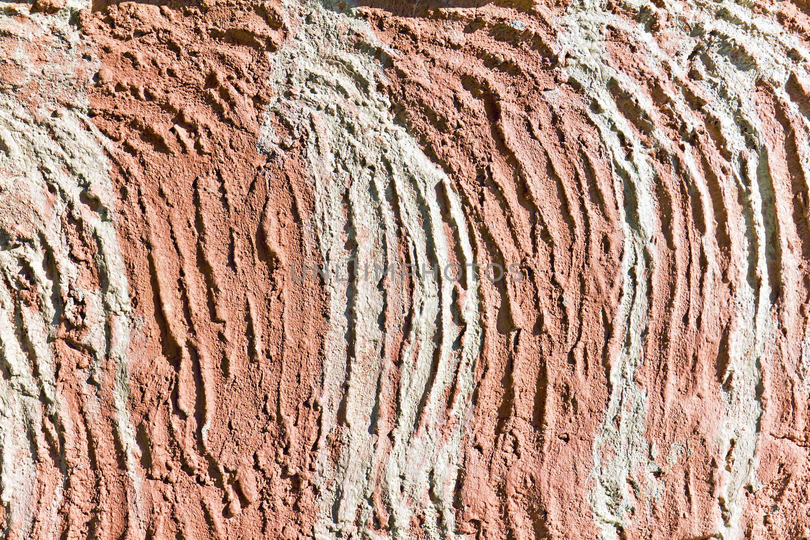 rough texture of decorative colored stucco in the background