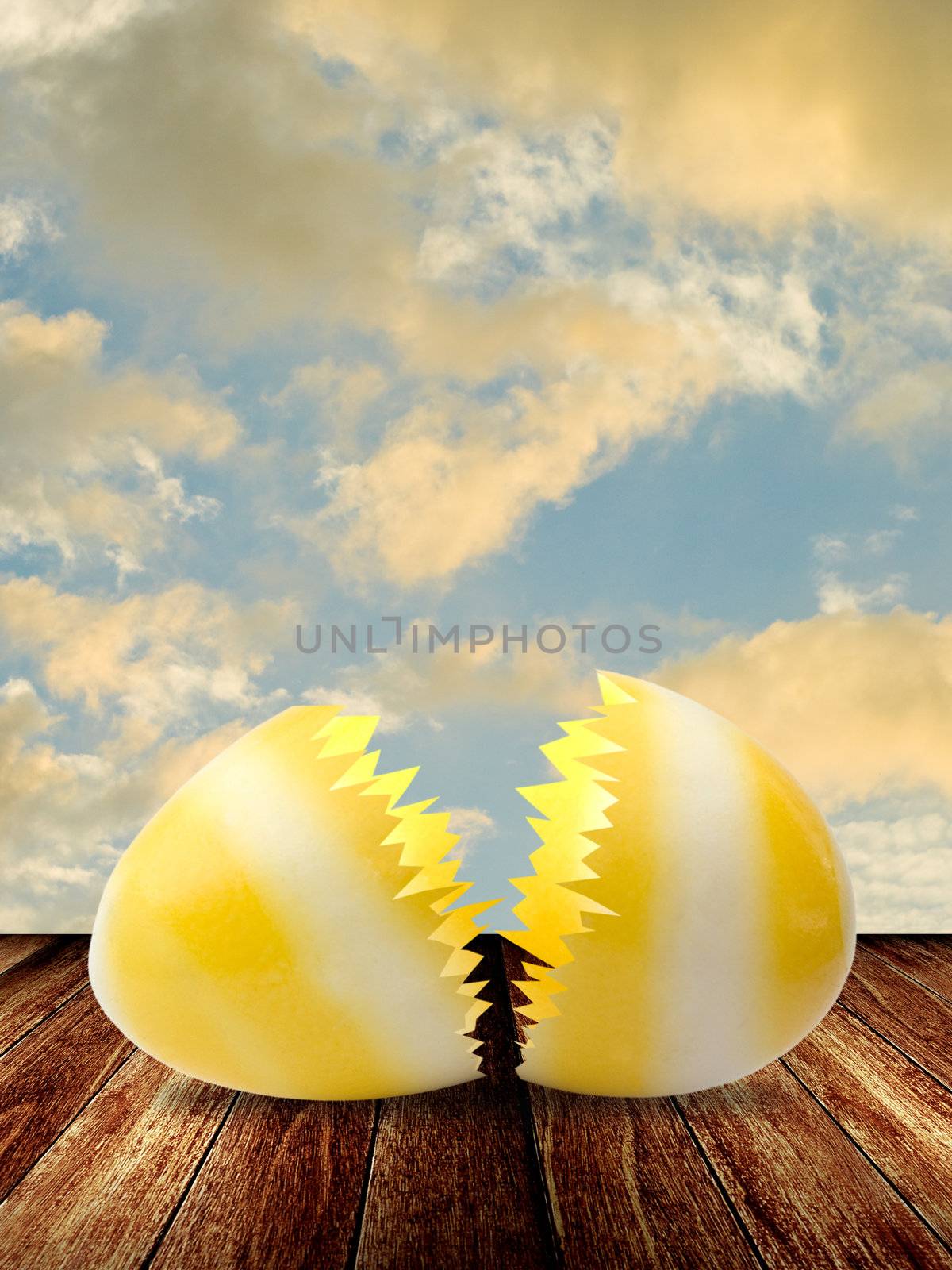 Broken easter egg on wooden table by pixbox77