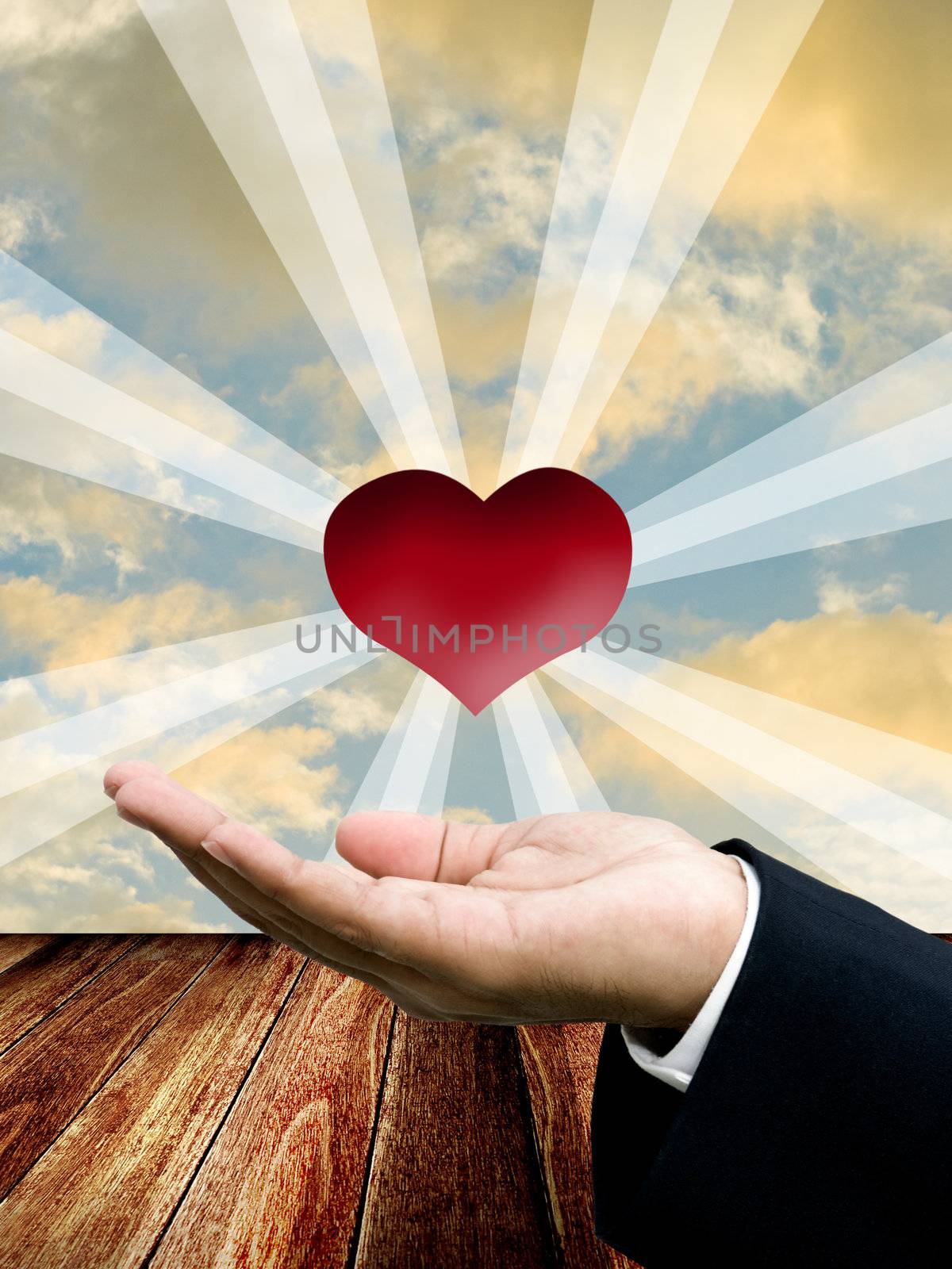 Red heart on businessman hand, Love and share concept