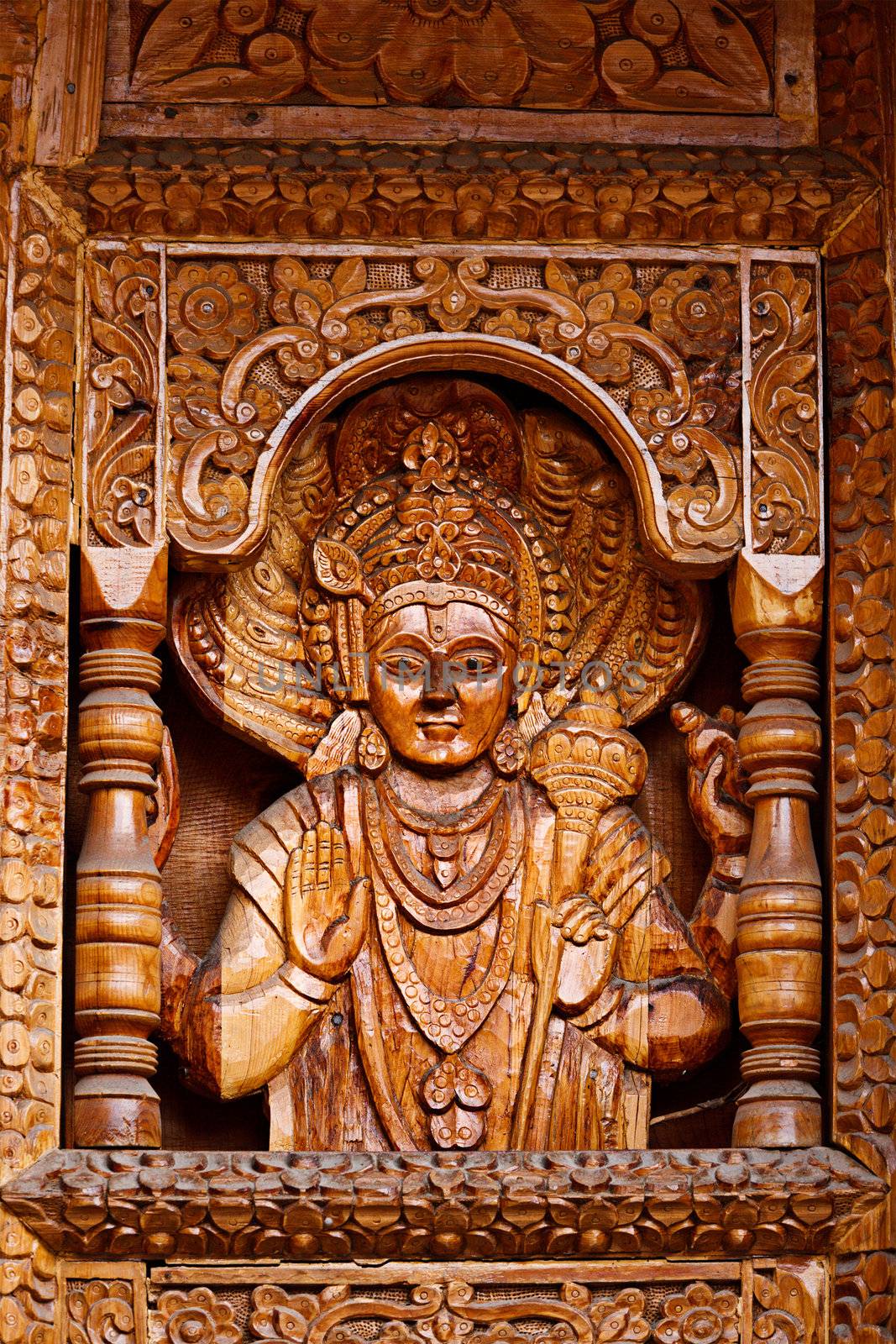 Ganesh - wood caring in Hinde temple in Himachal Pradesh, India