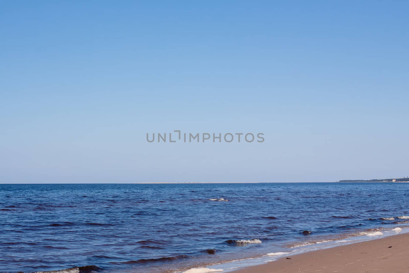 A lanscape with sea, sand and sky in sunny day
