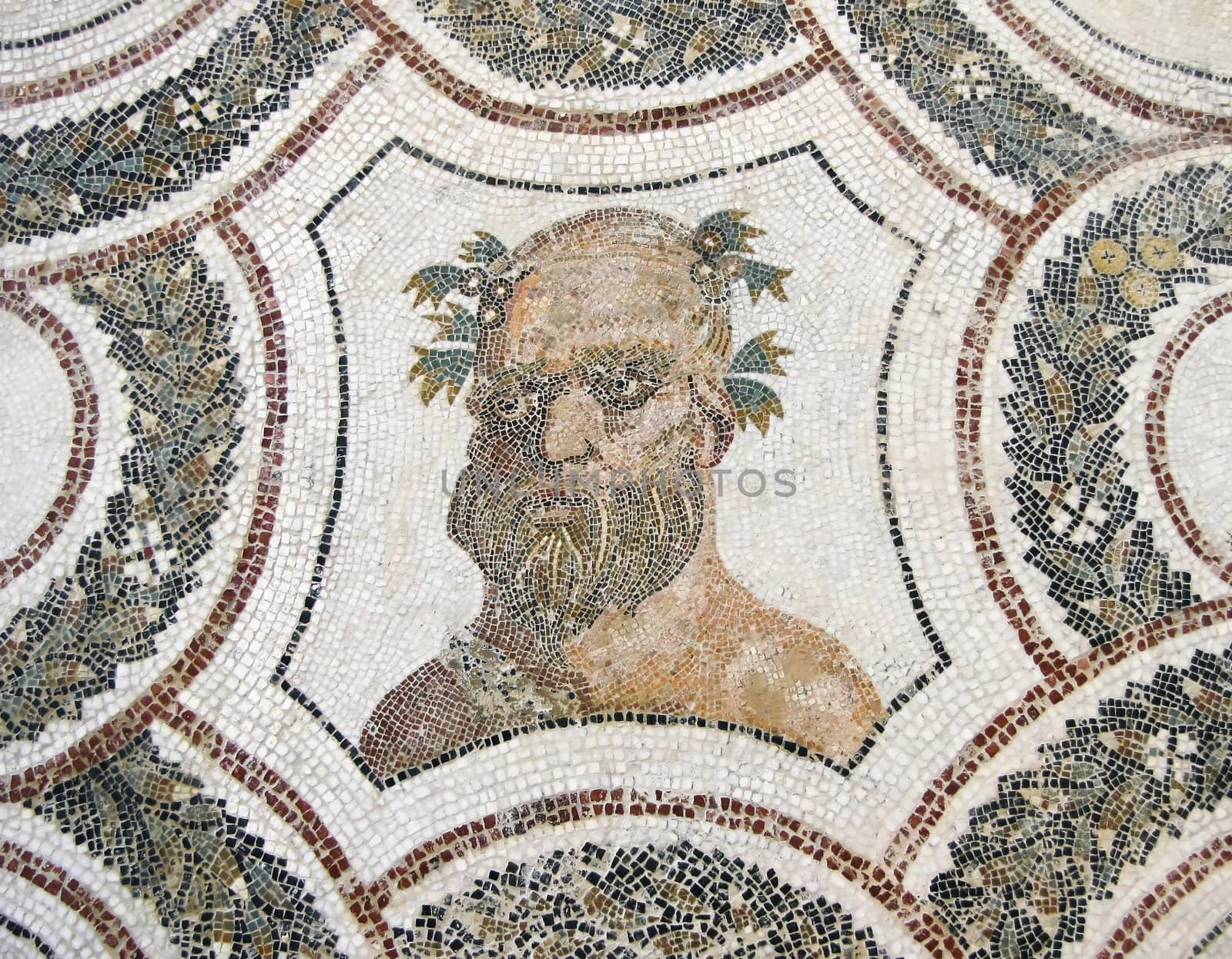 The head of Bacchus. Roman mosaic of El Jem in Tunisia