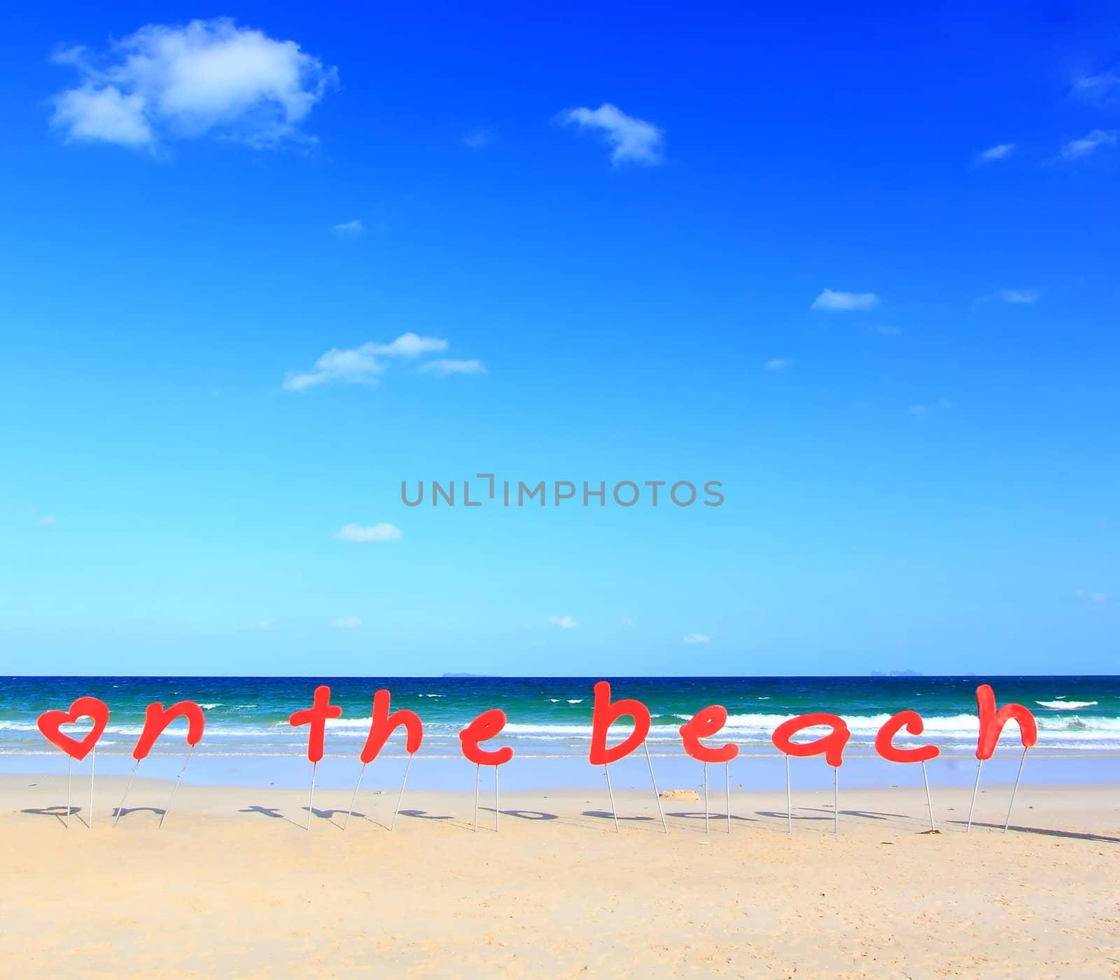 On the Beach Sign in Summer Time with nobody