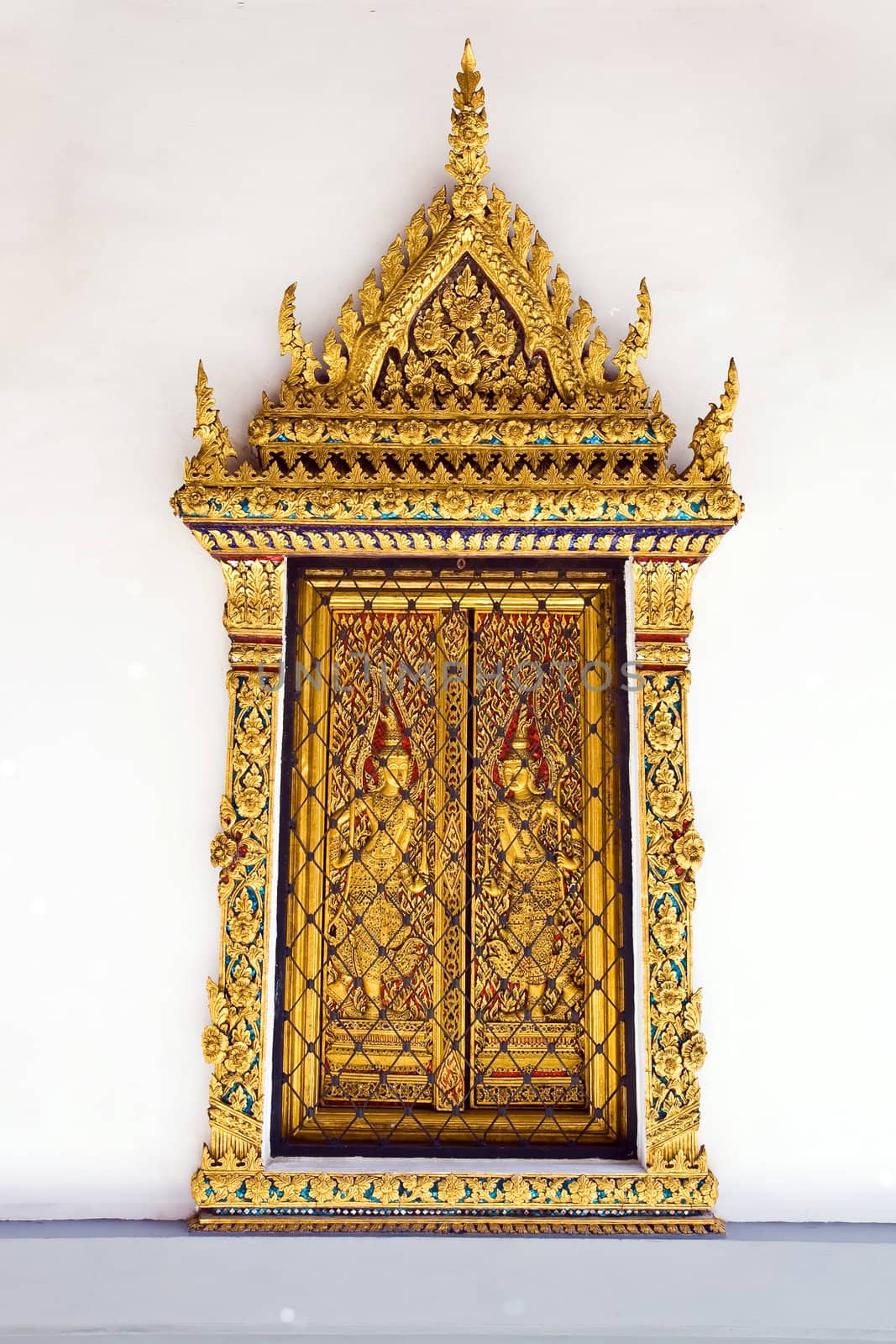 Golden Windows at Wat Phra Keao Temple in Grand Palace, Bangkok Thailand