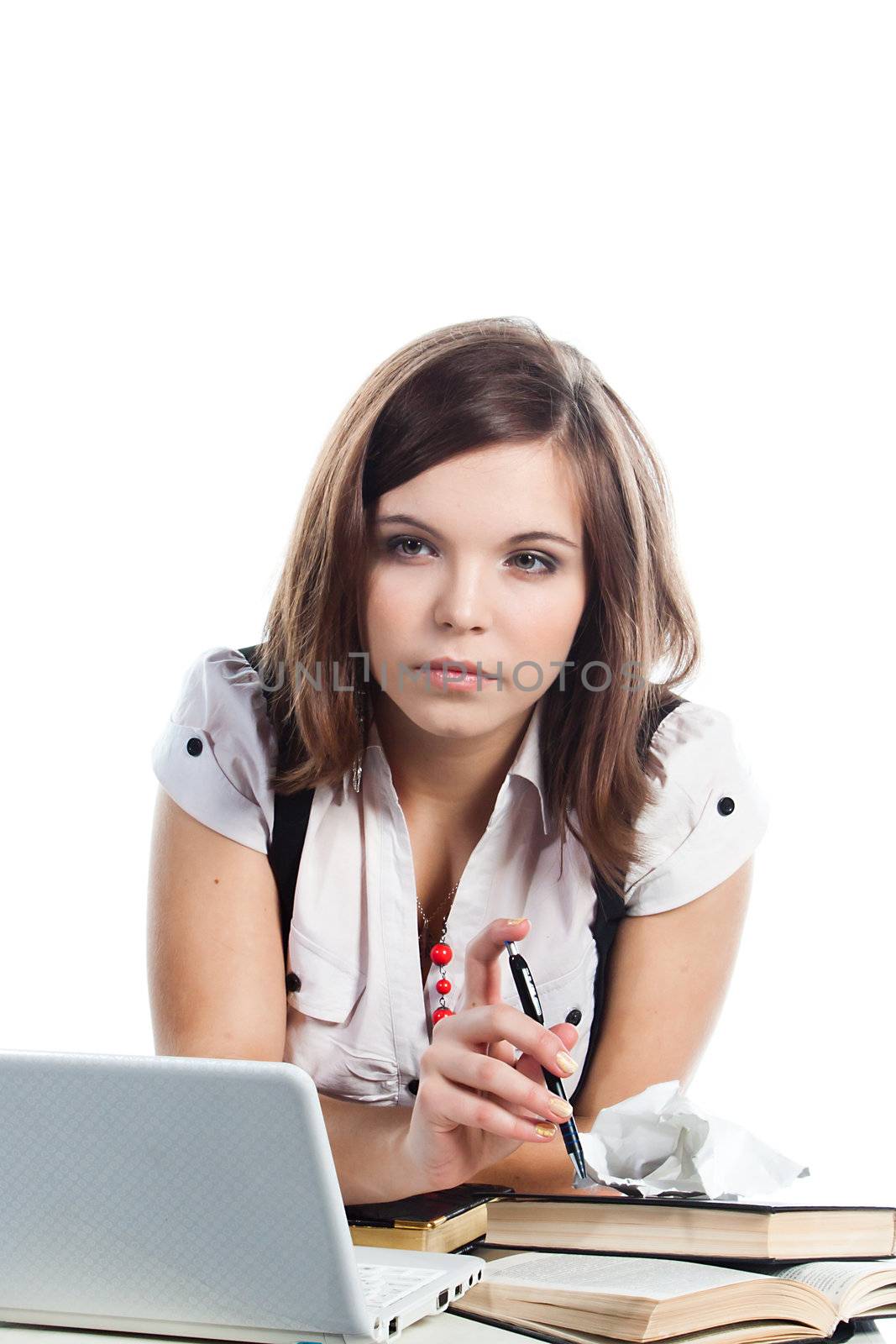 Portrait of a young and beautiful girl student who is preparing for exams
