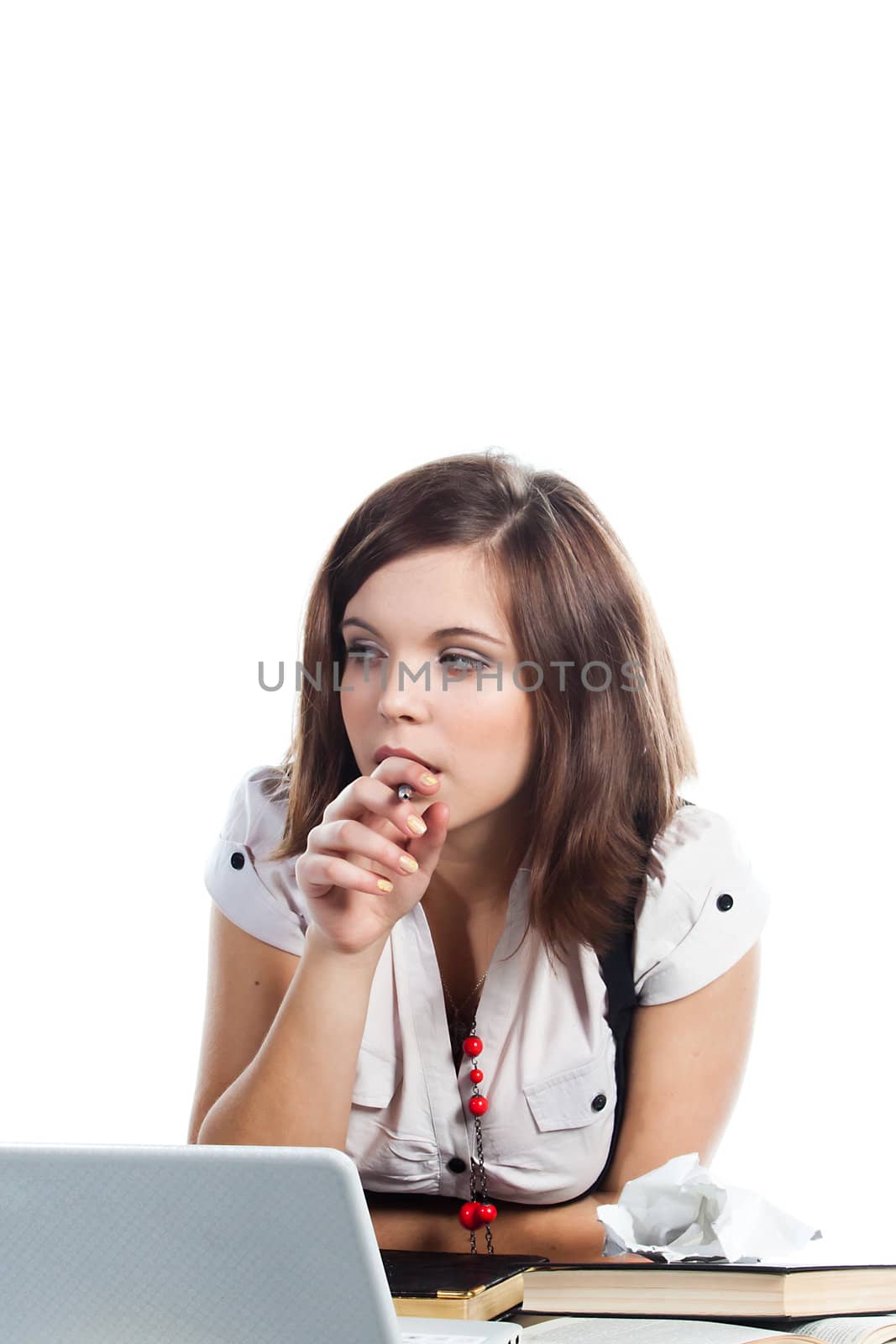 Portrait of a young and beautiful girl student who is preparing for exams