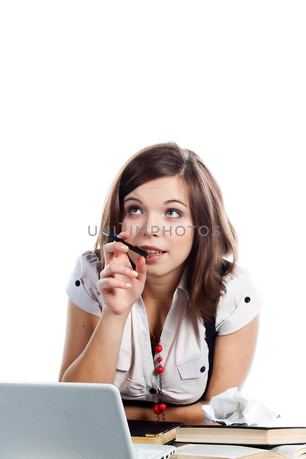 Portrait of a young and beautiful girl student who is preparing for exams