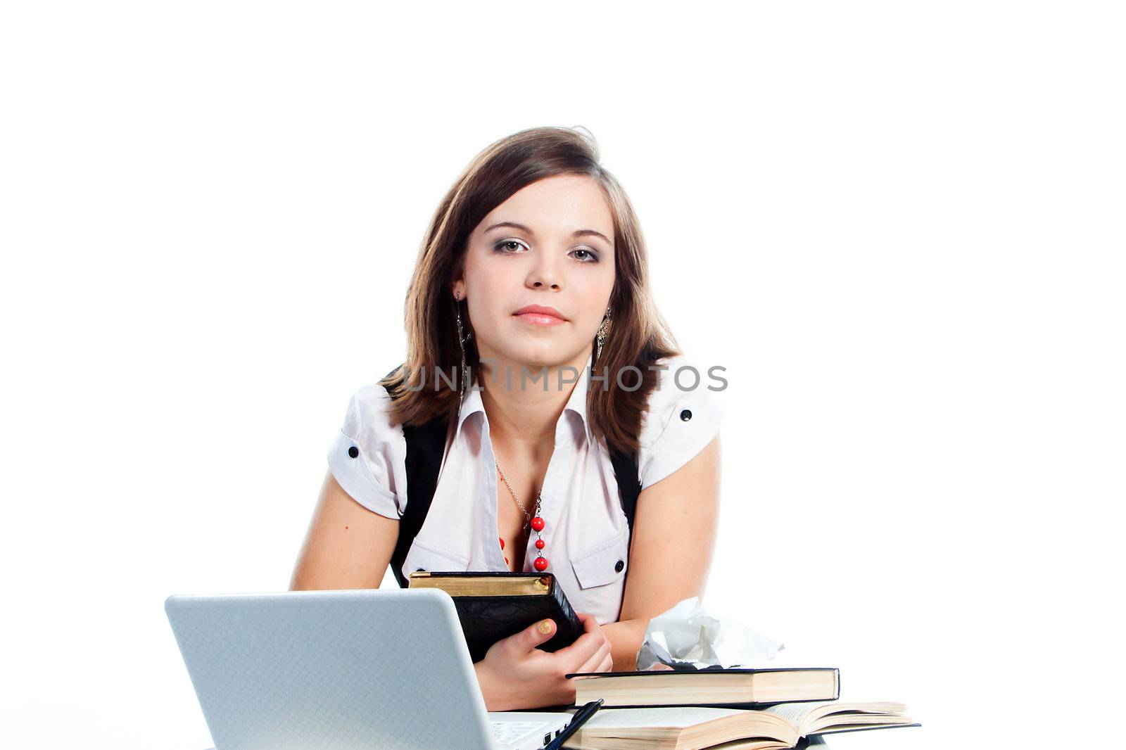 Portrait of a young and beautiful girl student who is preparing for exams