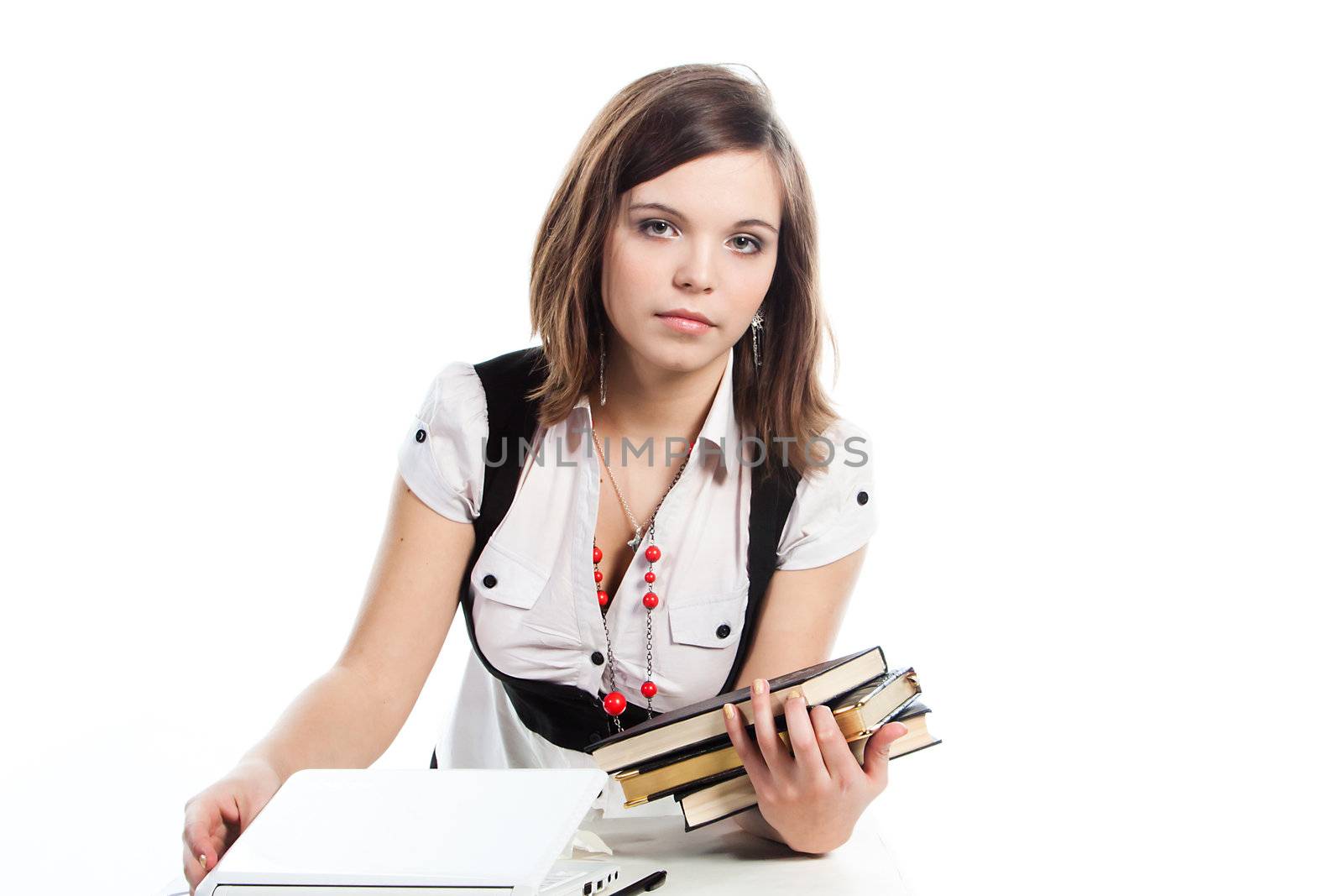 Portrait of a young and beautiful girl student who is preparing for exams