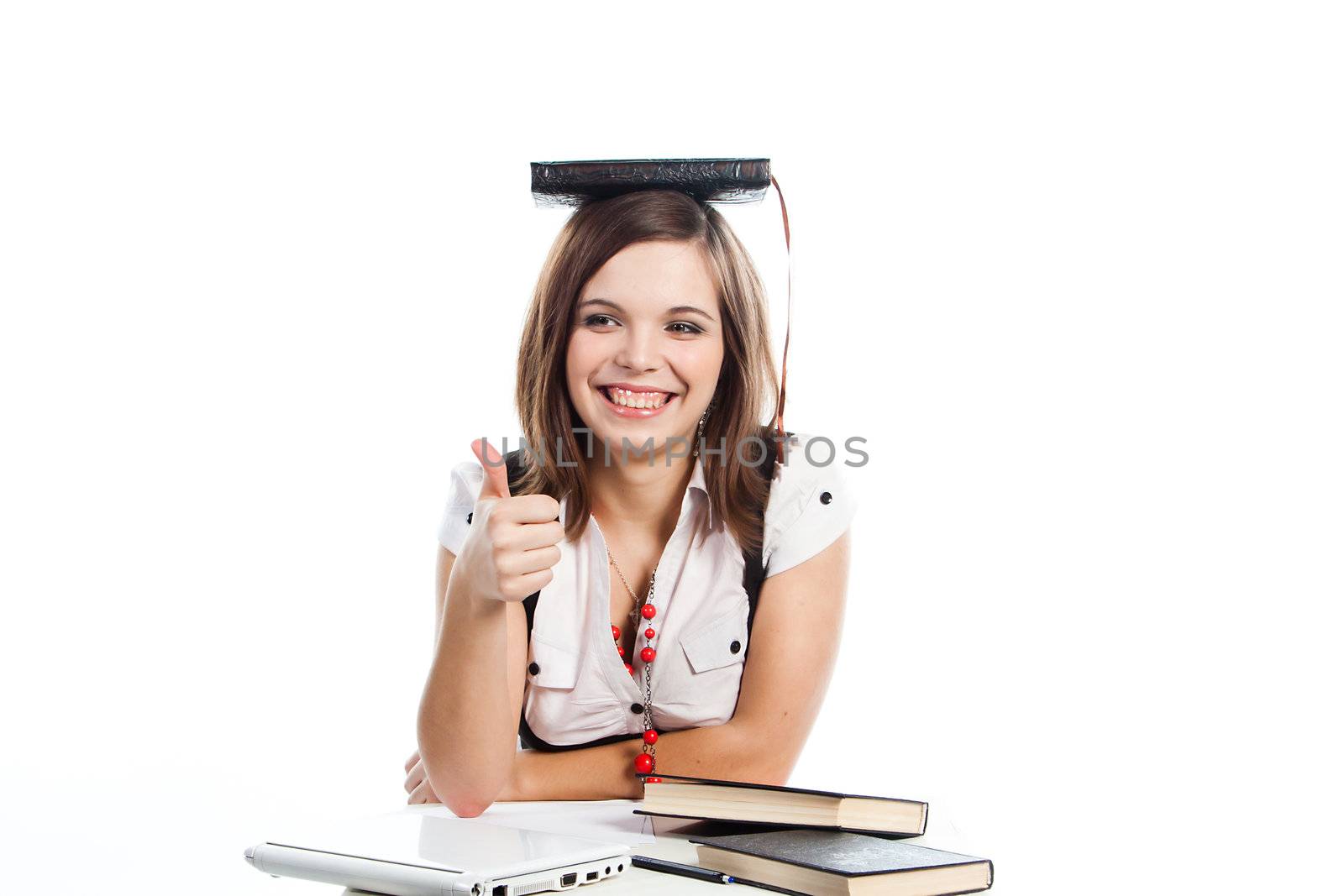 Portrait of a young and beautiful girl student who is preparing for exams