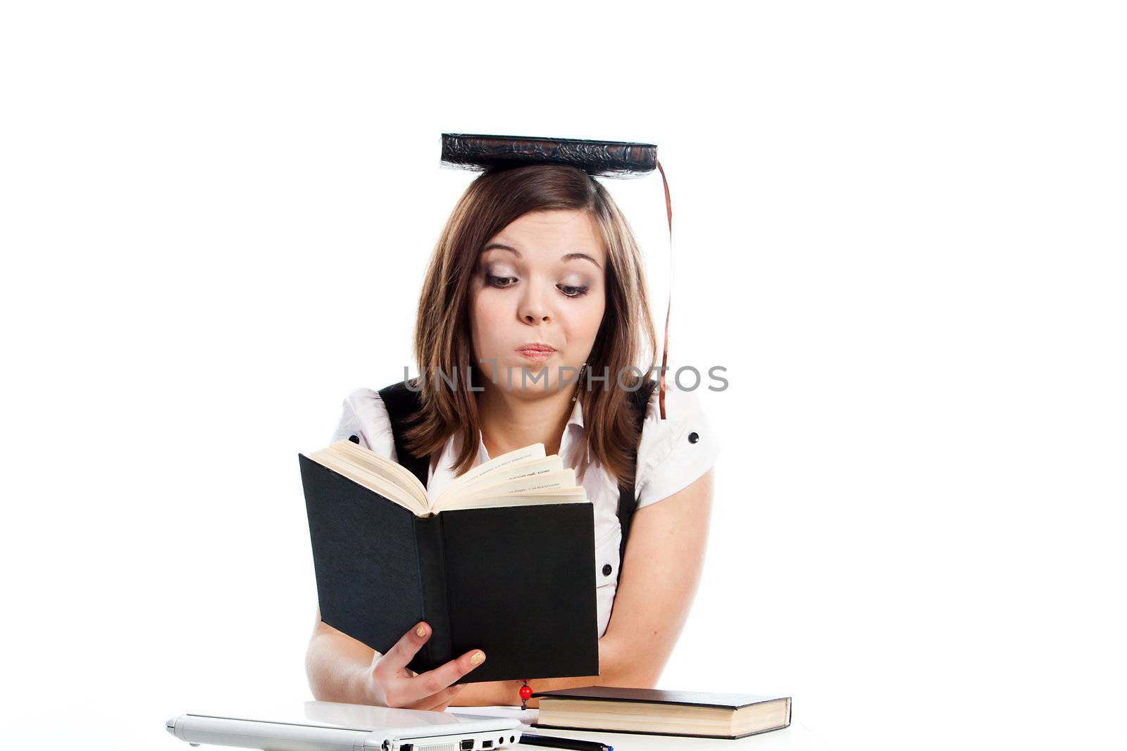 Portrait of a young and beautiful girl student who is preparing for exams