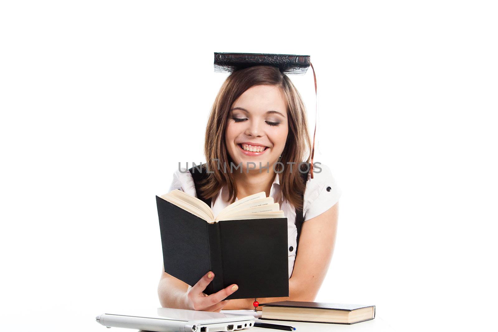 Portrait of a young and beautiful girl student who is preparing for exams