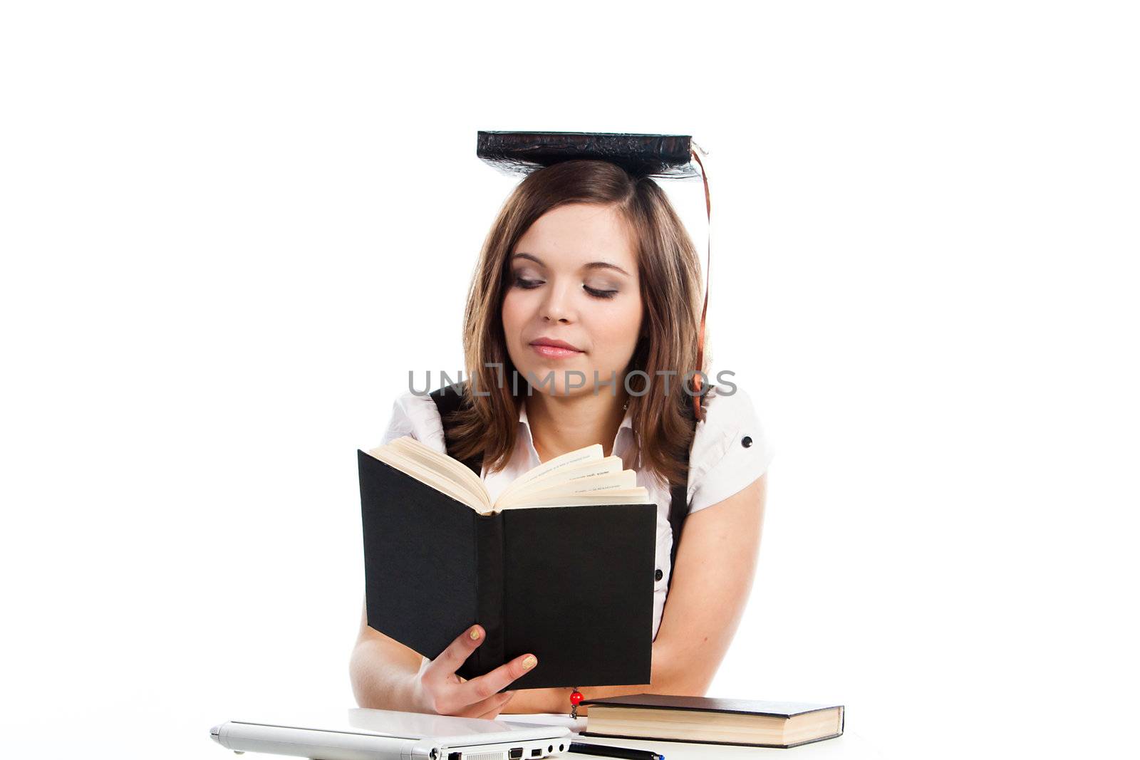 Portrait of a young and beautiful girl student who is preparing for exams