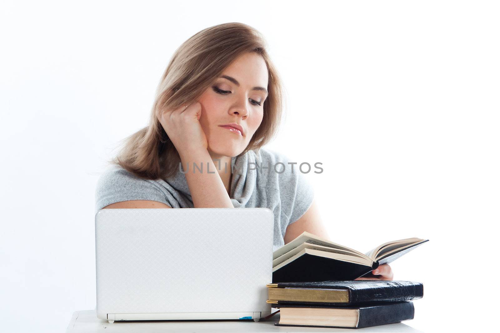 Portrait of a young and beautiful girl student who is preparing for exams