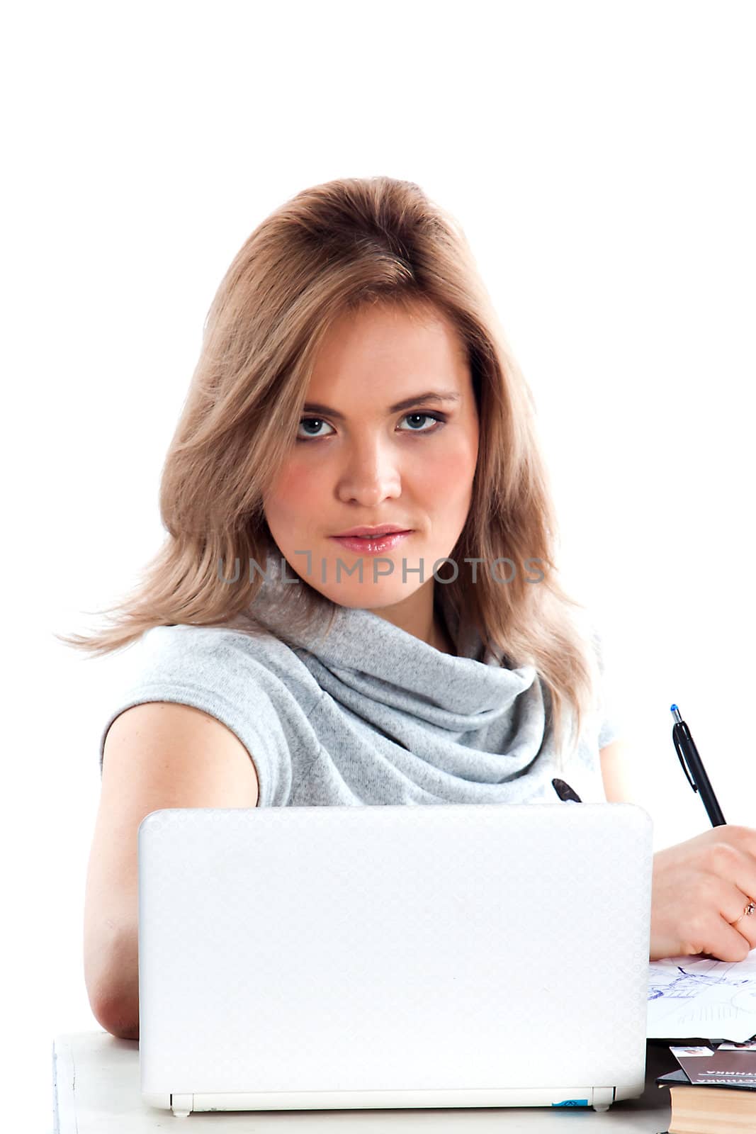 Portrait of a young and beautiful girl student who is preparing for exams