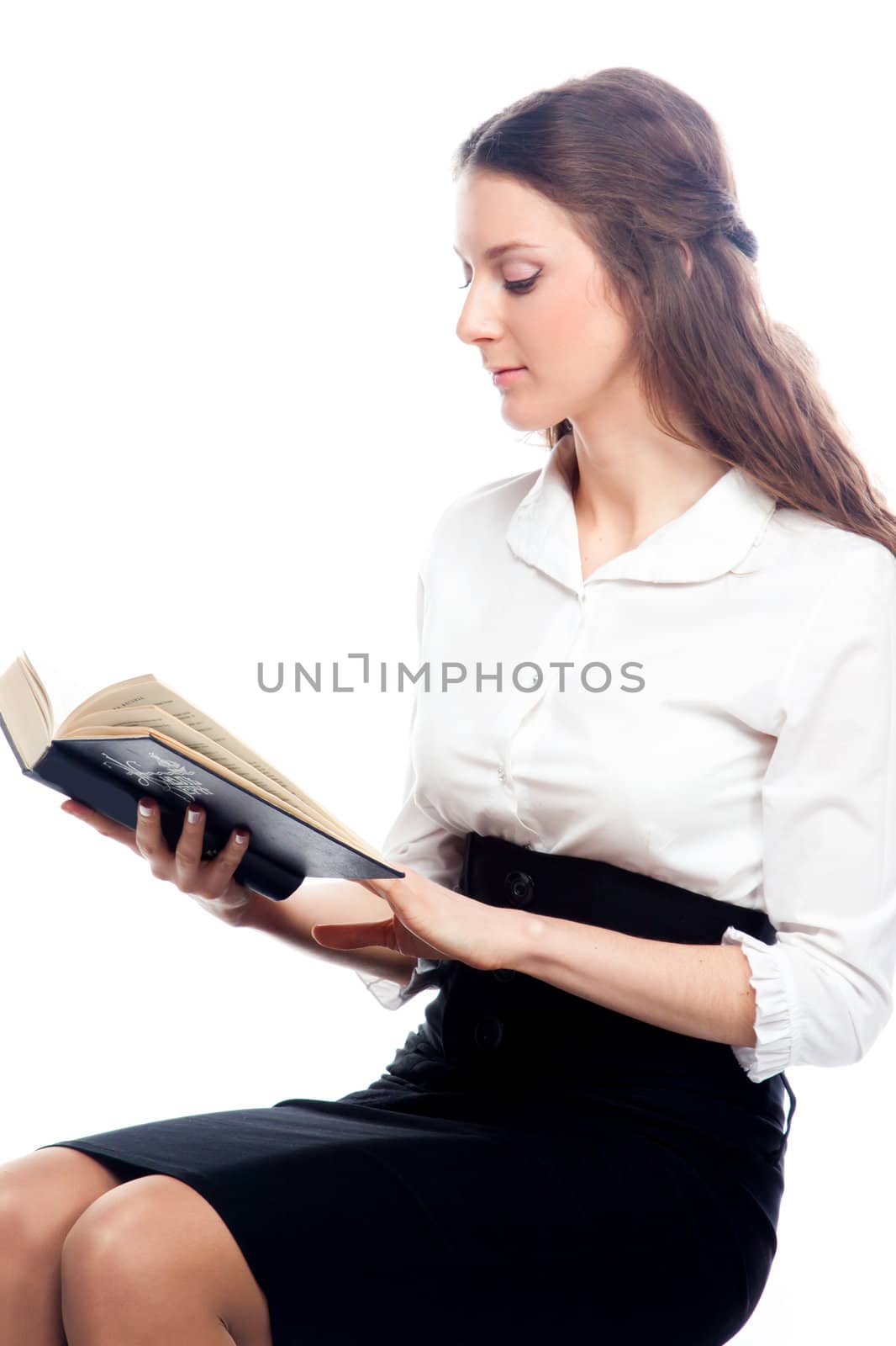 Portrait of a young and beautiful girl student who is preparing for exams