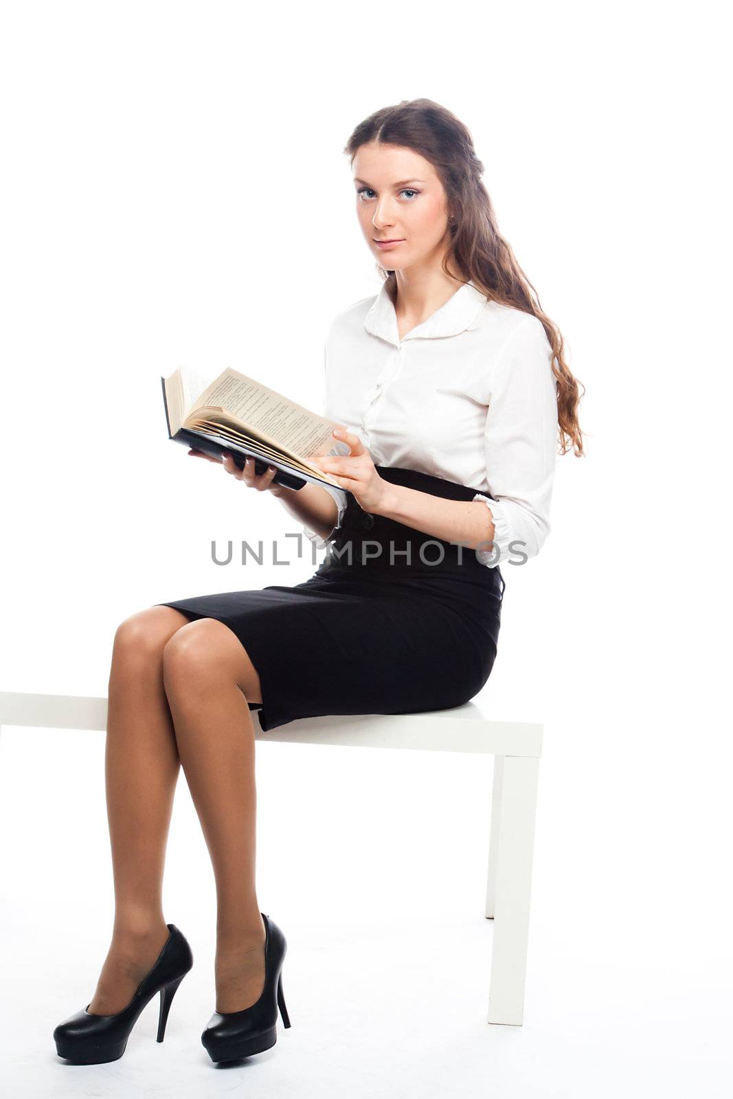 Portrait of a young and beautiful girl student who is preparing for exams