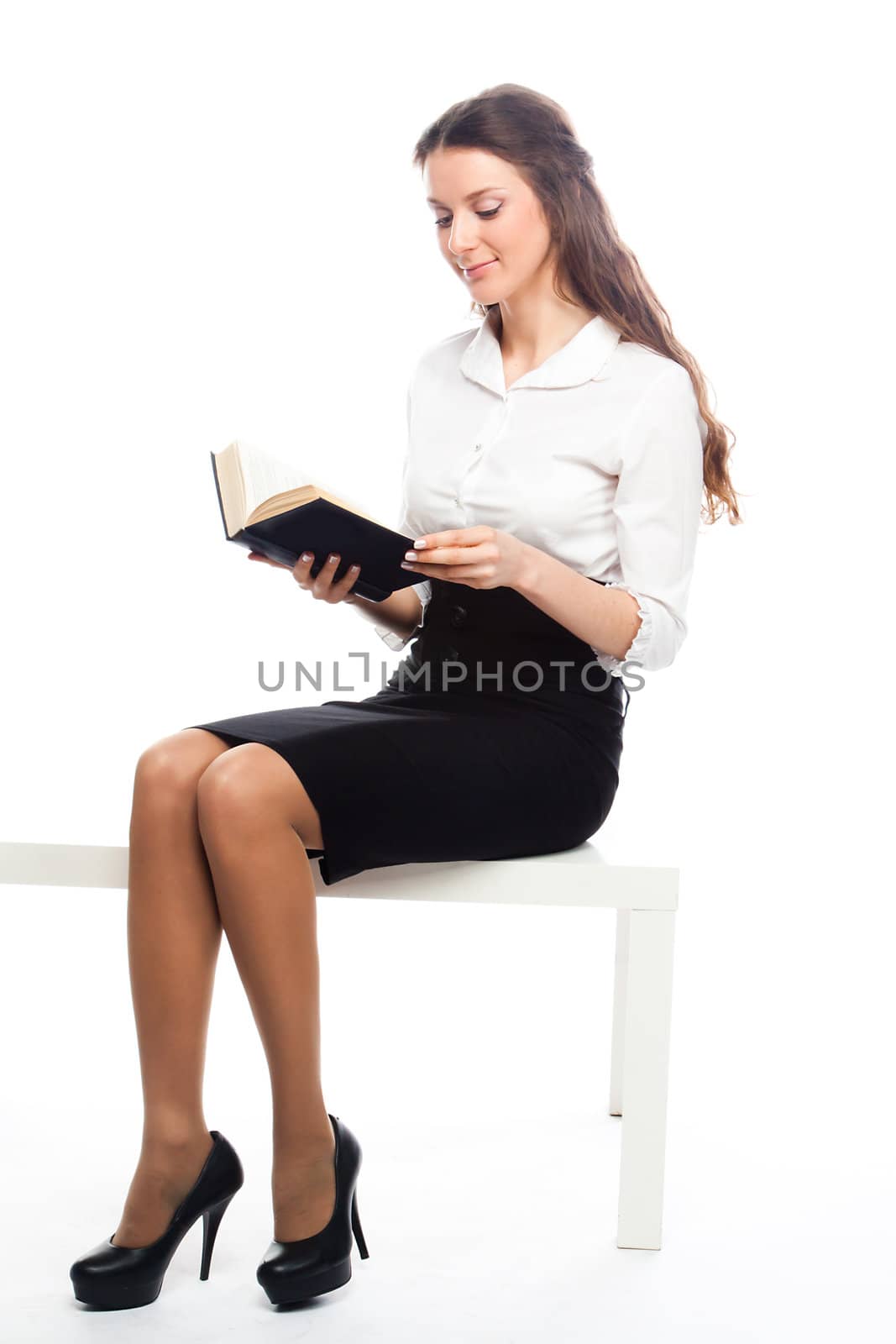 Portrait of a young and beautiful girl student who is preparing for exams